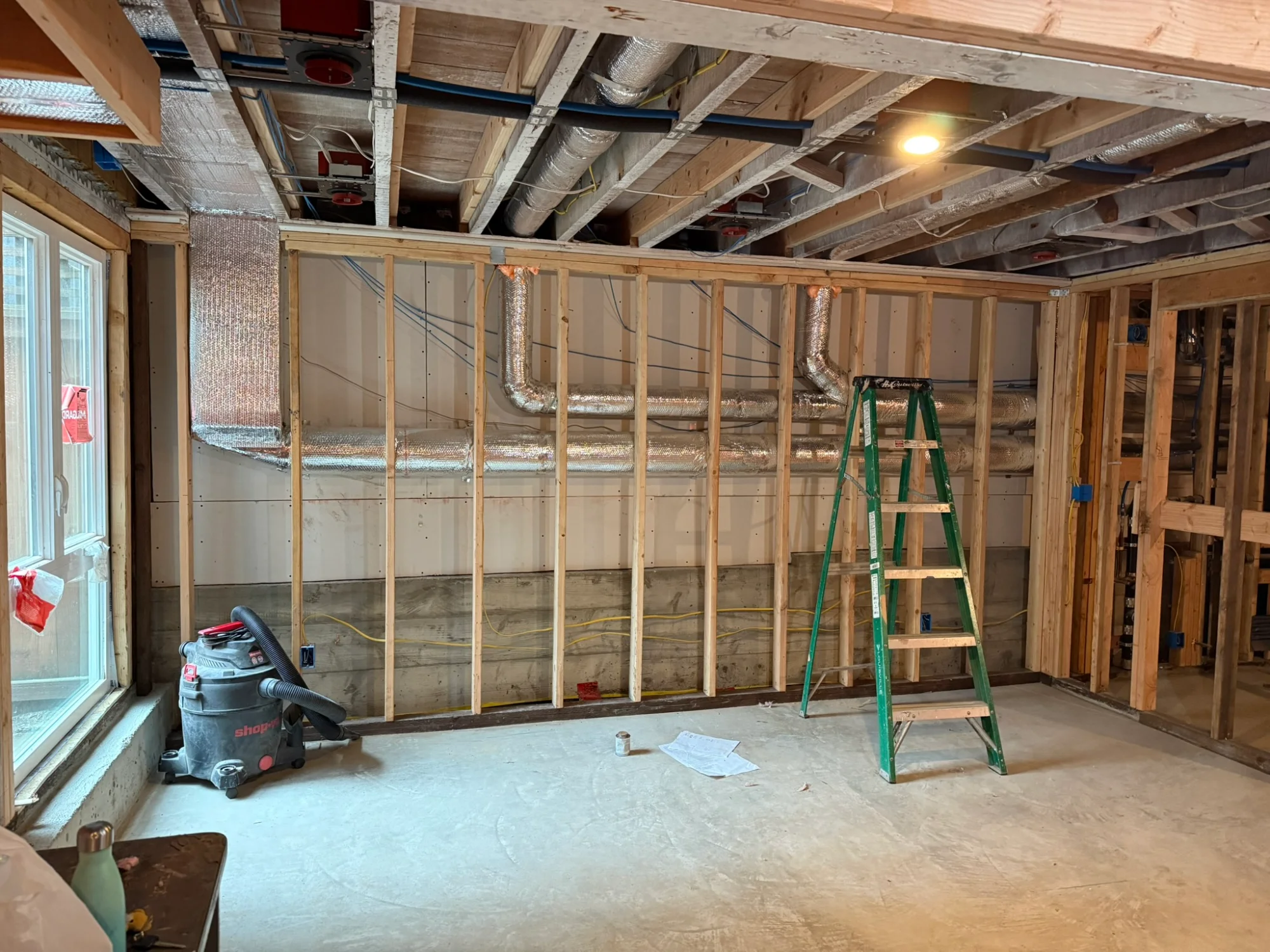 Ground floor conversion in progress with new siding and framing in San Francisco