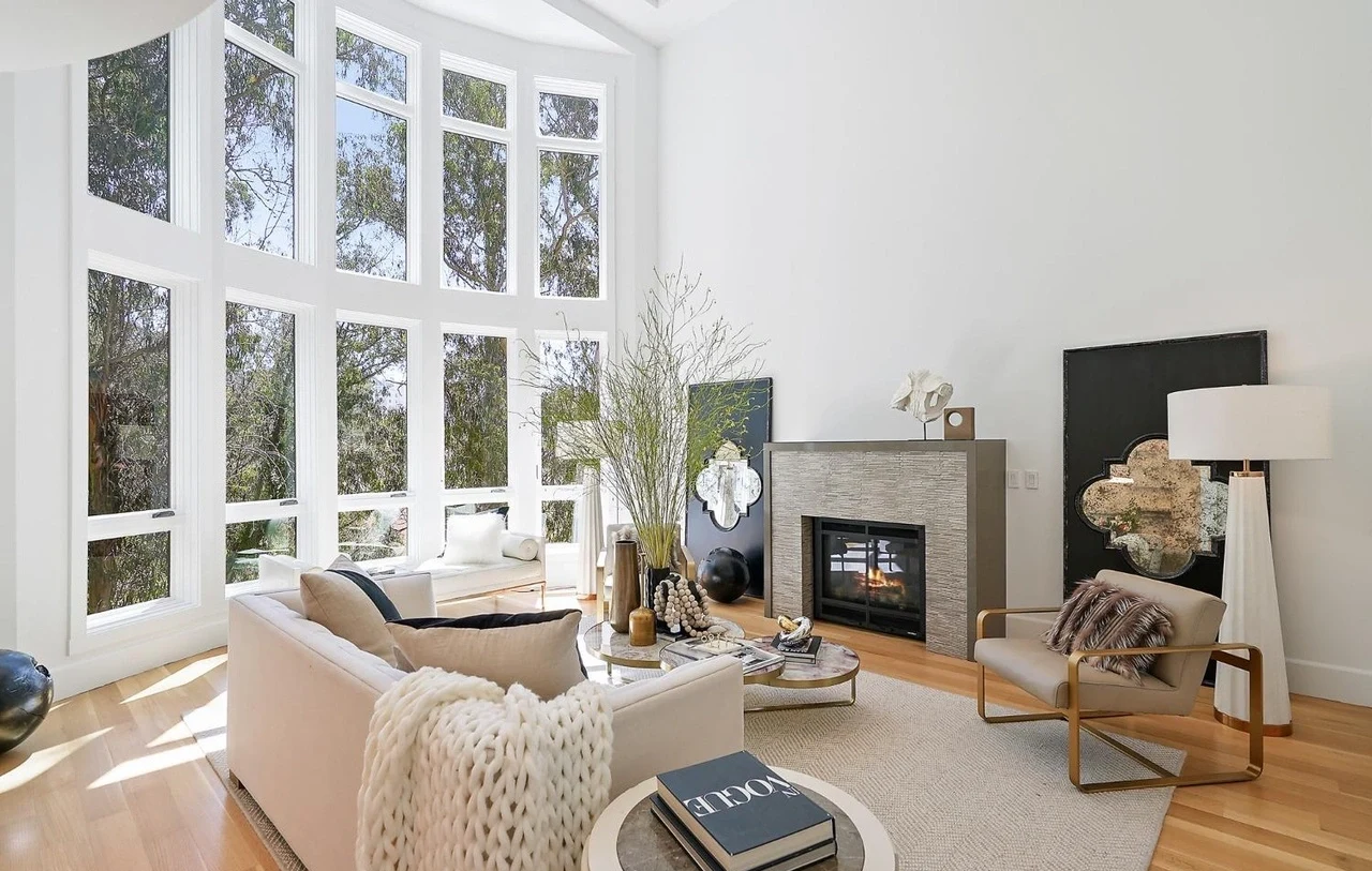 Bright remodeled living room with a fireplace in a completed San Francisco home