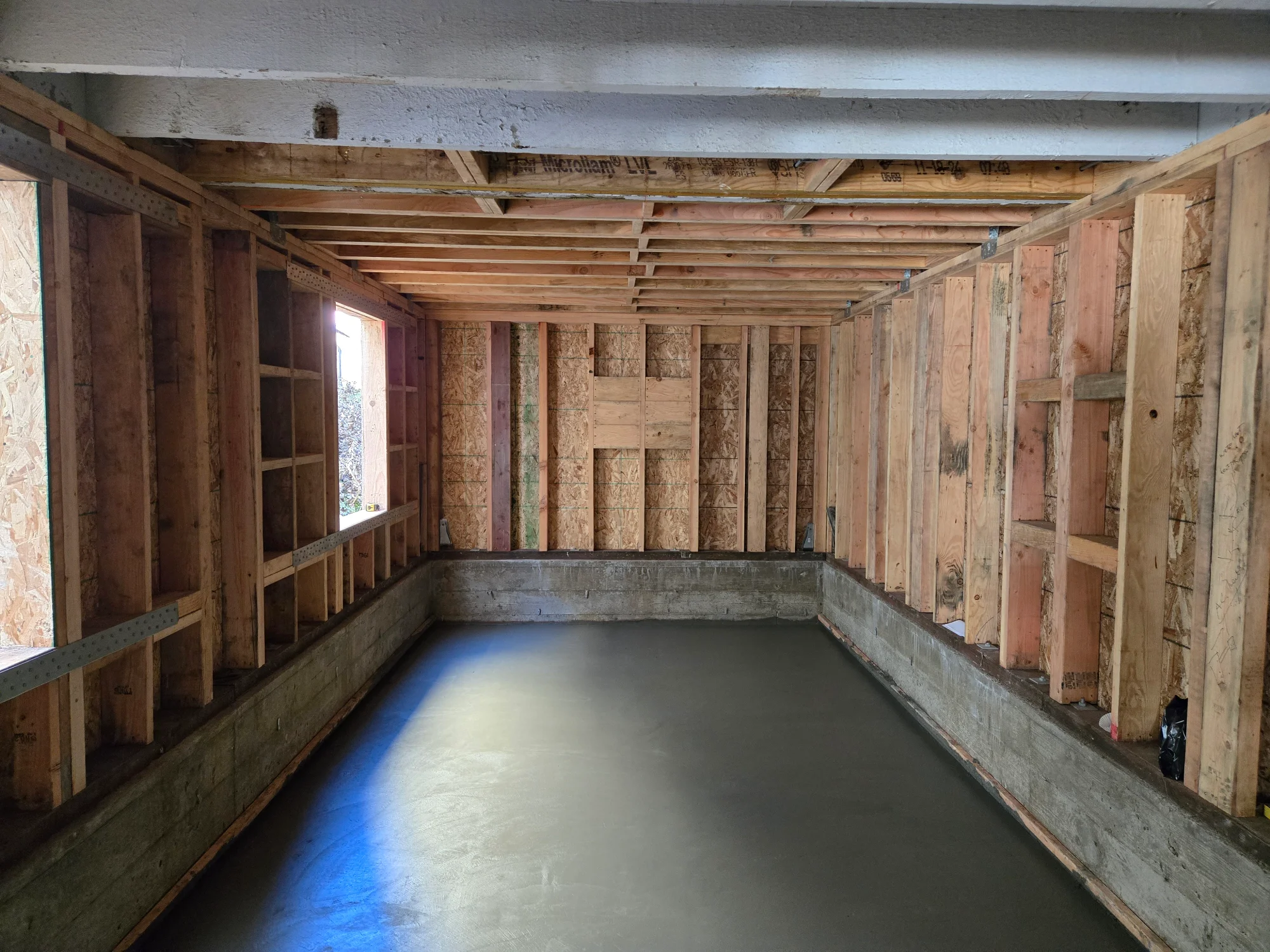 Rebar grid tied and formed for a new concrete foundation pour in San Francisco